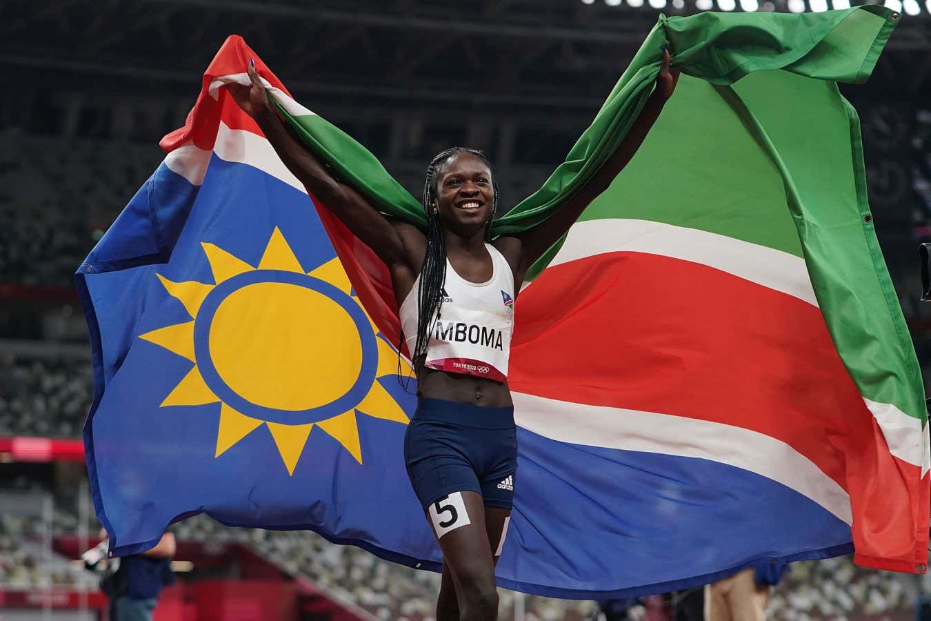 (210803) -- TOKYO, Aug. 3, 2021 (Xinhua) -- Christine Mboma of Namibia celebrates after the women's 200m final at Tokyo 2020 Olympic Games, in Tokyo, Japan, Aug. 3, 2021. (Xinhua/Lui Siu Wai) Xinhua News Agency / eyevine Contact eyevine for more information about using this image: T: +44 (0) 20 8709 8709 E: info@eyevine.com http://www.eyevine.com
