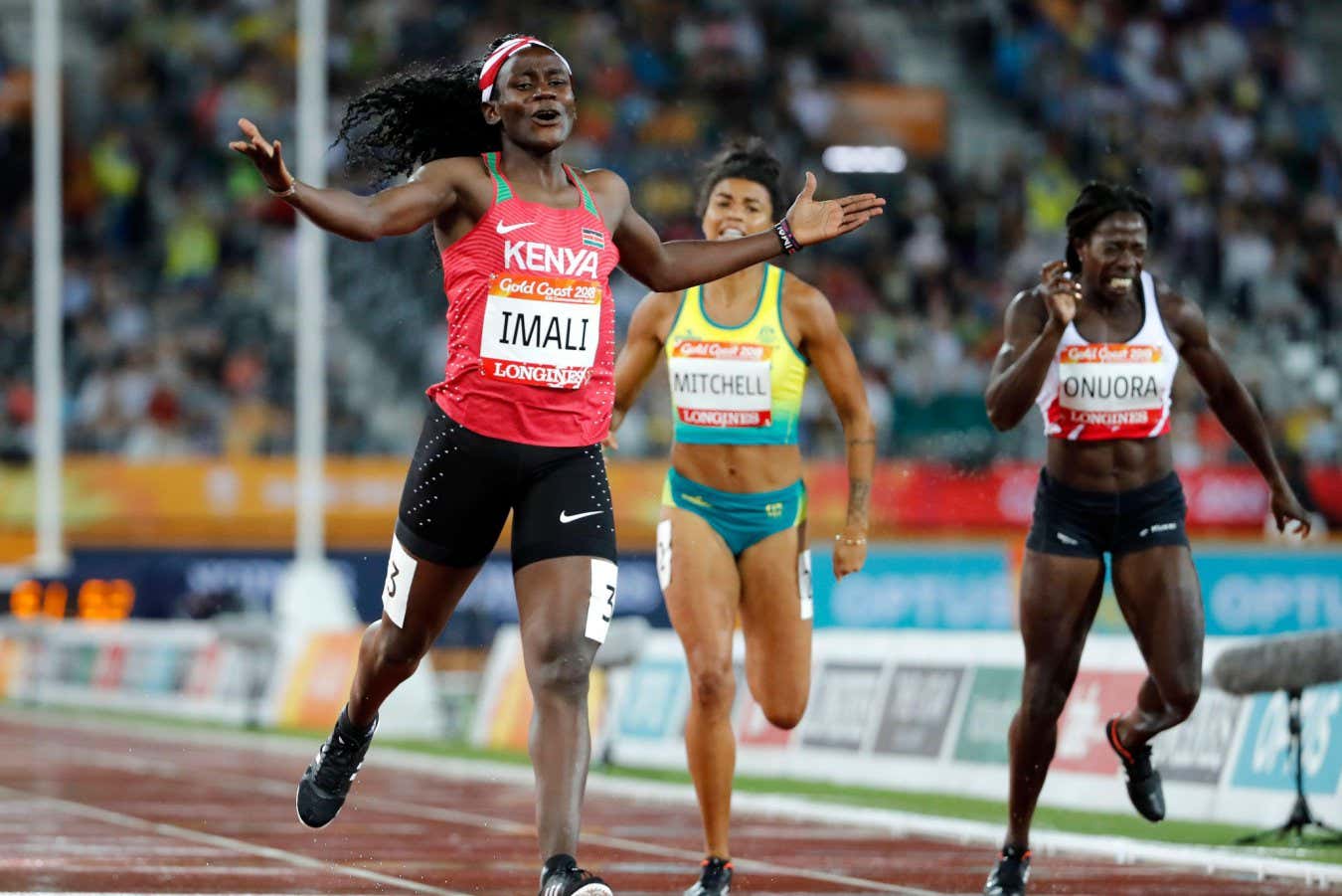 2MNHFJ6 Kenya's Maximila Imali reacts as she crosses the finish line to win her women's 400m semifinal at Carrara Stadium during the 2018 Commonwealth Games on the Gold Coast, Australia, Tuesday, April 10, 2018. (AP Photo/Mark Schiefelbein)