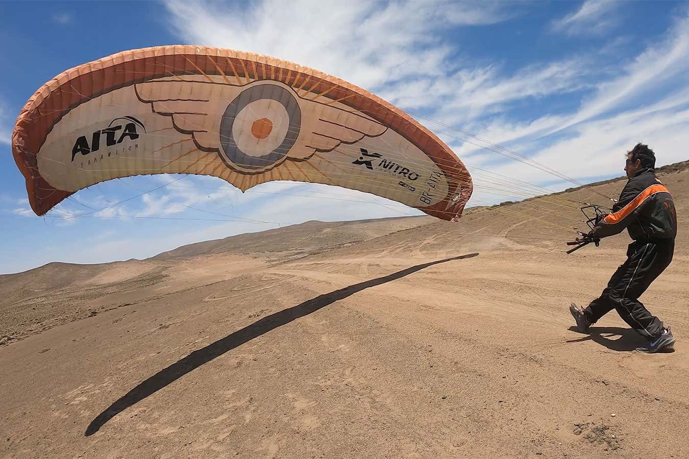 Paramotorists prepare to cross the Peruvian desert oases