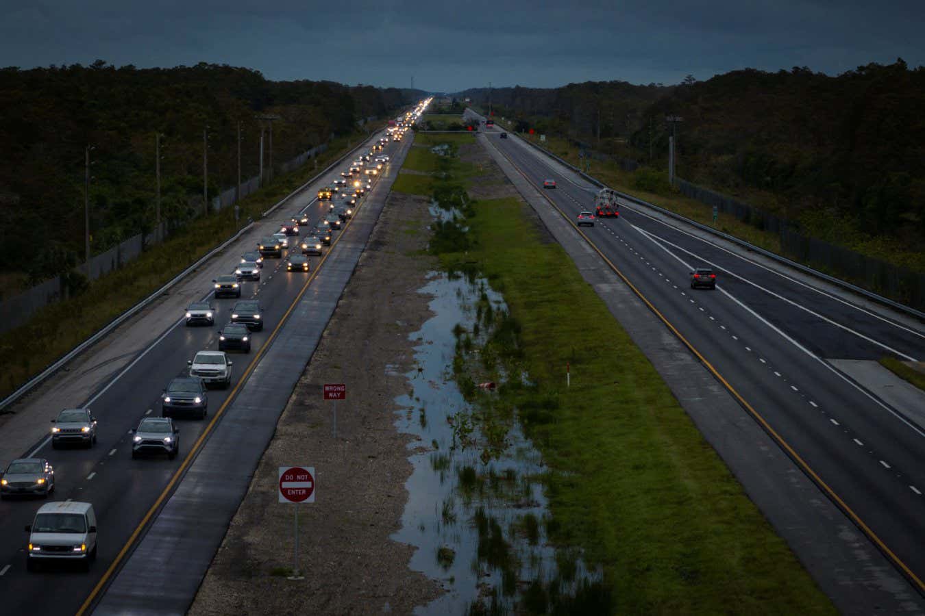 A drone view shows commuters driving east from the west coast ahead of the arrival of Hurricane Milton on Interstate 75, Florida