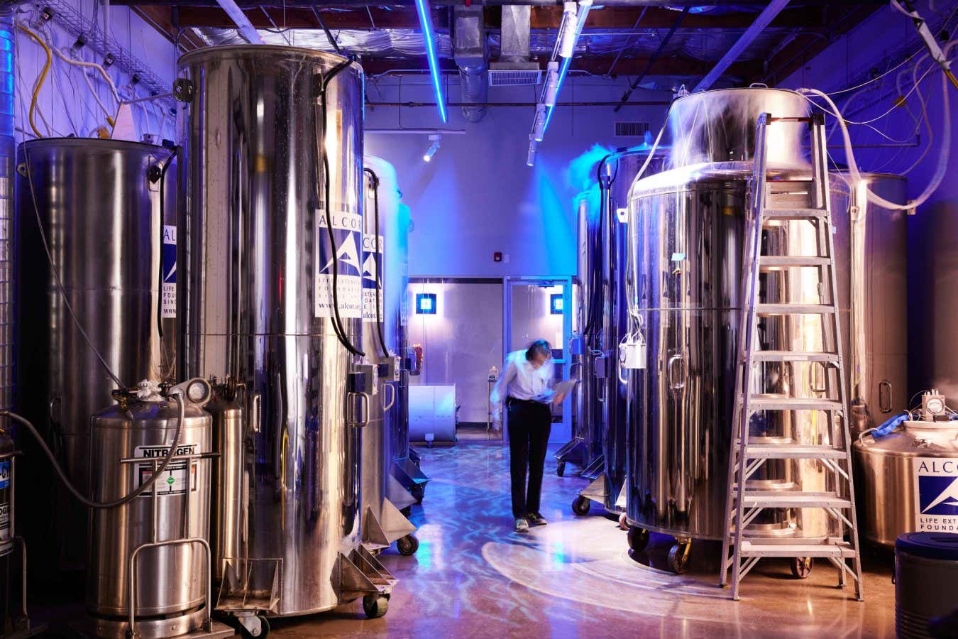 Dr. Michael Perry checks on patients at the Alcor Life Extension Foundation, Scottsdale, AZ, June 24, 2021. The business of cryopreservation -- storing bodies at deep freeze until well into the future -- got a whole lot more complicated during the coronavirus pandemic. (Jesse Rieser/The New York Times) / Redux / eyevine Please agree fees before use. SPECIAL RATES MAY APPLY. For further information please contact eyevine tel: +44 (0) 20 8709 8709 e-mail: info@eyevine.com www.eyevine.com