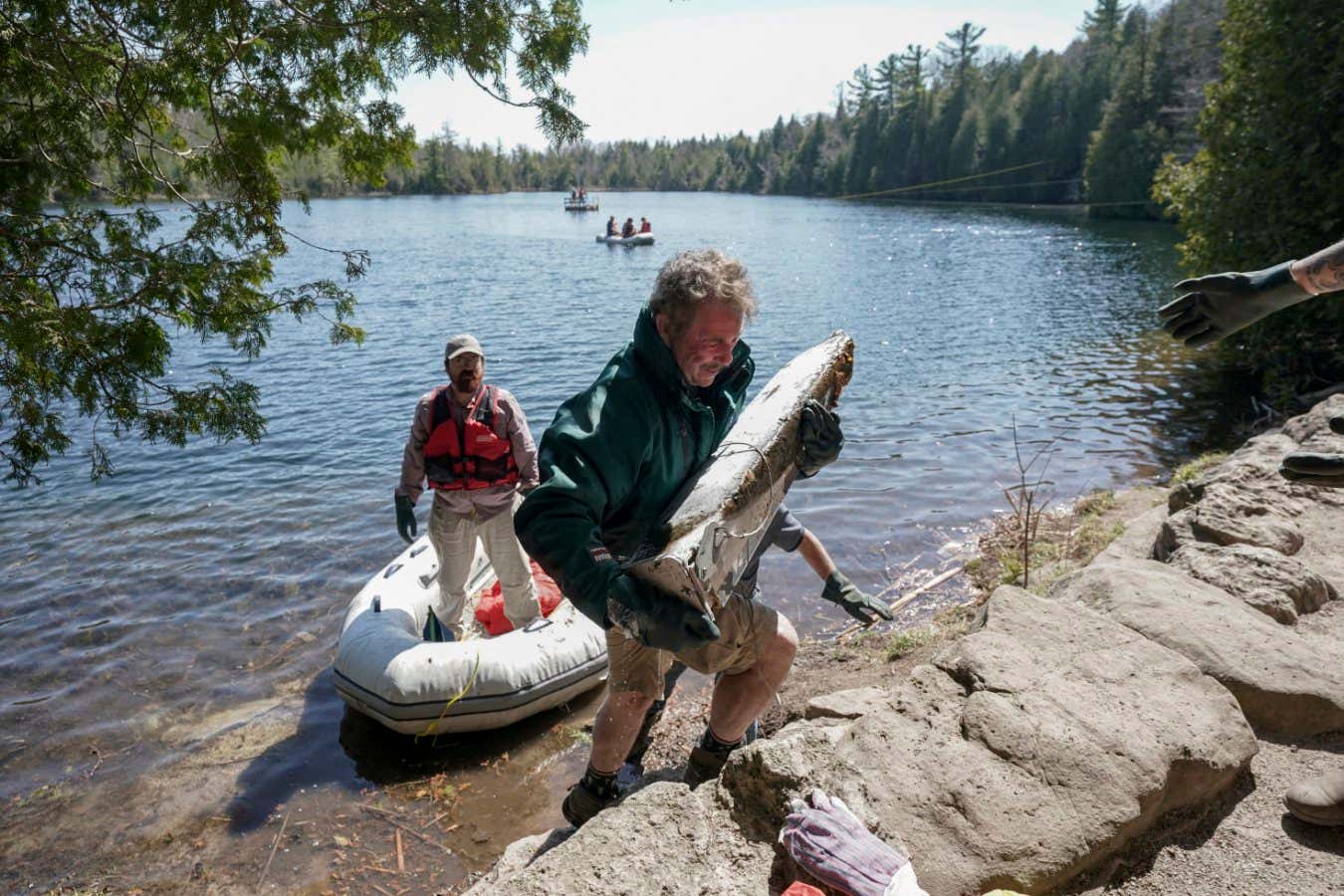MILTON, ON - APRIL 13: Professor Tim Patterson of Carleton University transports a frozen core sample at Crawford Lake on April 13, 2023 in Milton, Ontario. Patterson is a member of the Anthropocene Working Group and has been conducting research based on frozen core samples from the lake. He is among a group of scientists who think we have entered a new geological epoch. (Photo by Bonnie Jo Mount/The Washington Post via Getty Images)