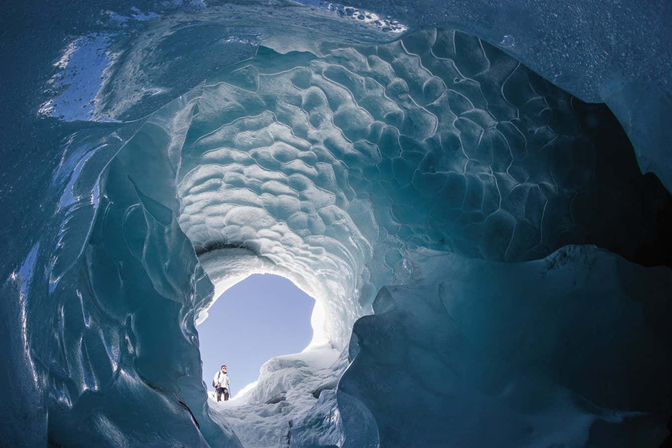 Vadret da Morteratsch (Morteratsch Glacier), Engadin, Switzerland, 2009 Meltwater has carved an englacial tunnel into the glacier. In winter, a descent through the tunnel became possible, as no meltwater was then flowing. Page 136+137