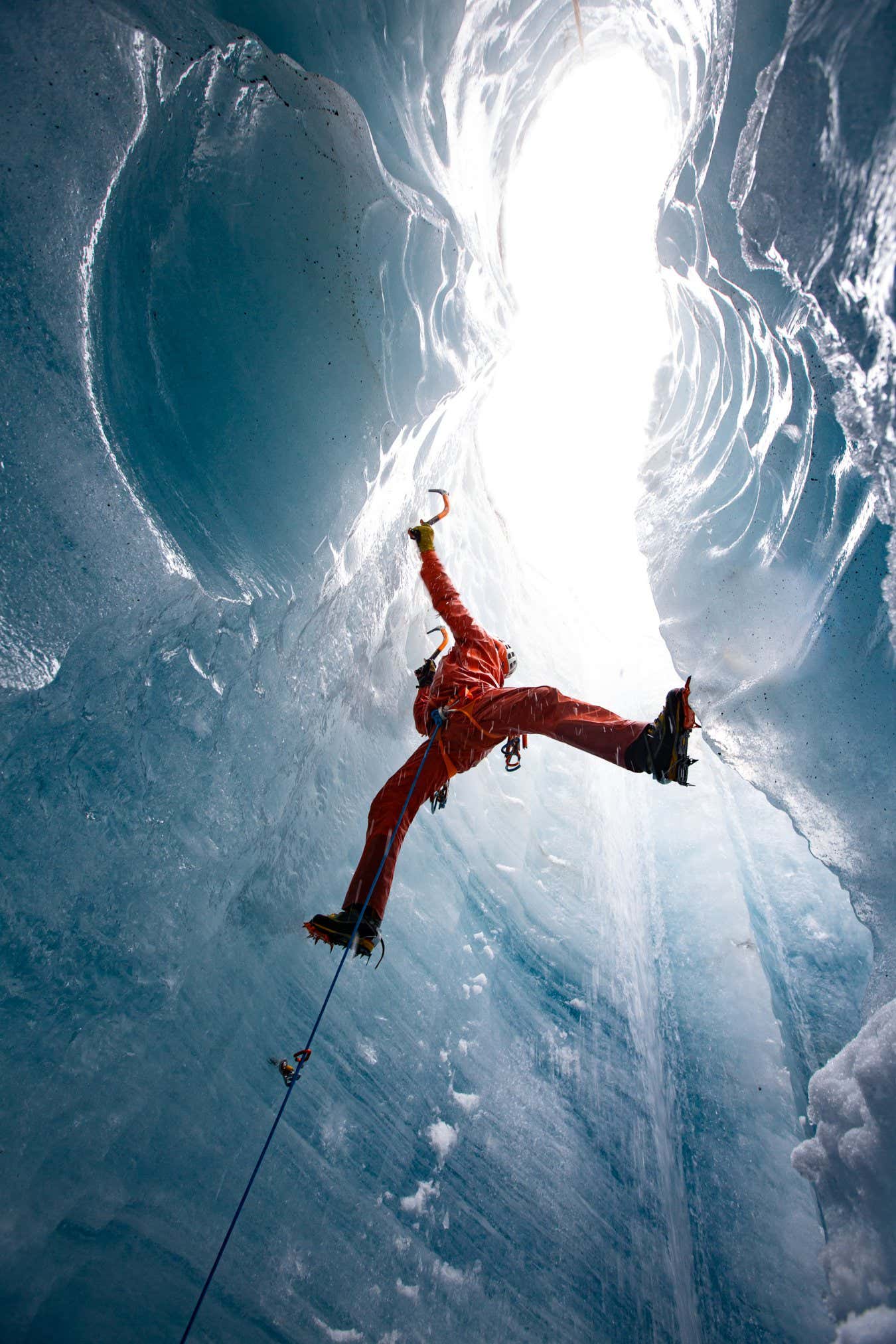 A skylight marks the exit of the ice hole in the overhanging ice.