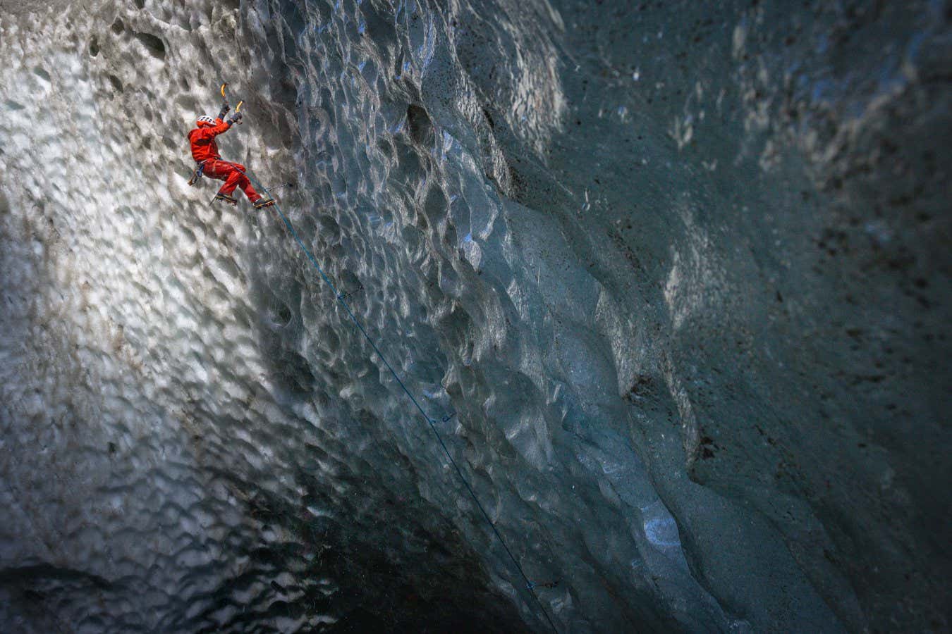 A natural ice cave formed by glacial retreat, at the edge of a moraine.